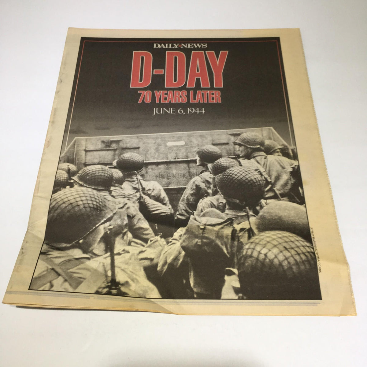New York Daily News D-Day 70 Years Later cover featuring soldiers preparing for combat, June 6, 1944.
