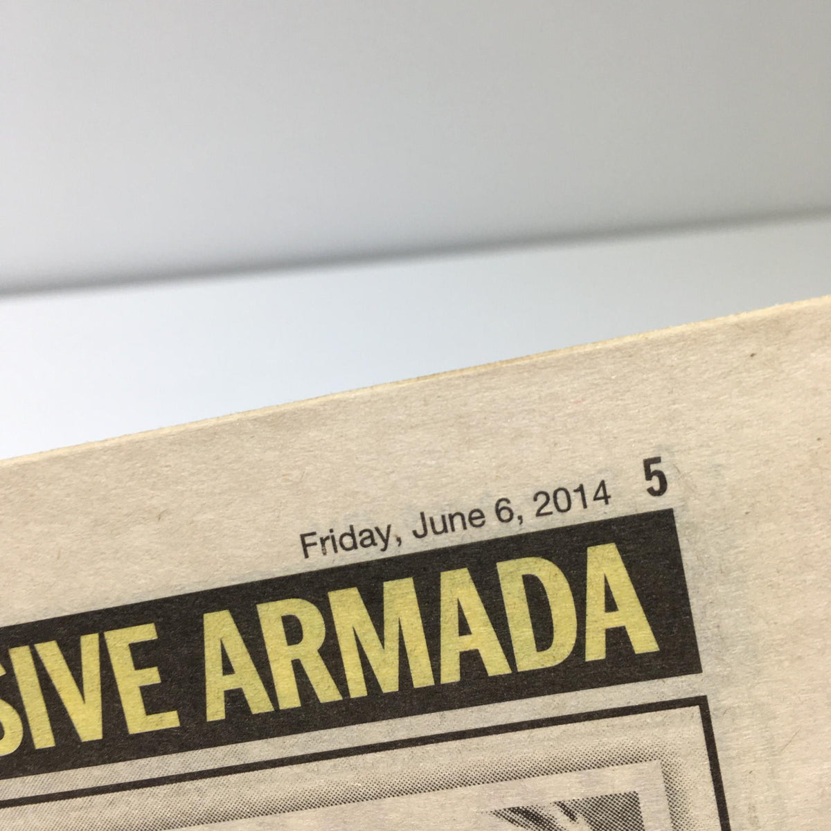 New York Daily News dated June 6, 2014, highlighting D-Day 70 Years Later with a date printed in the top corner.