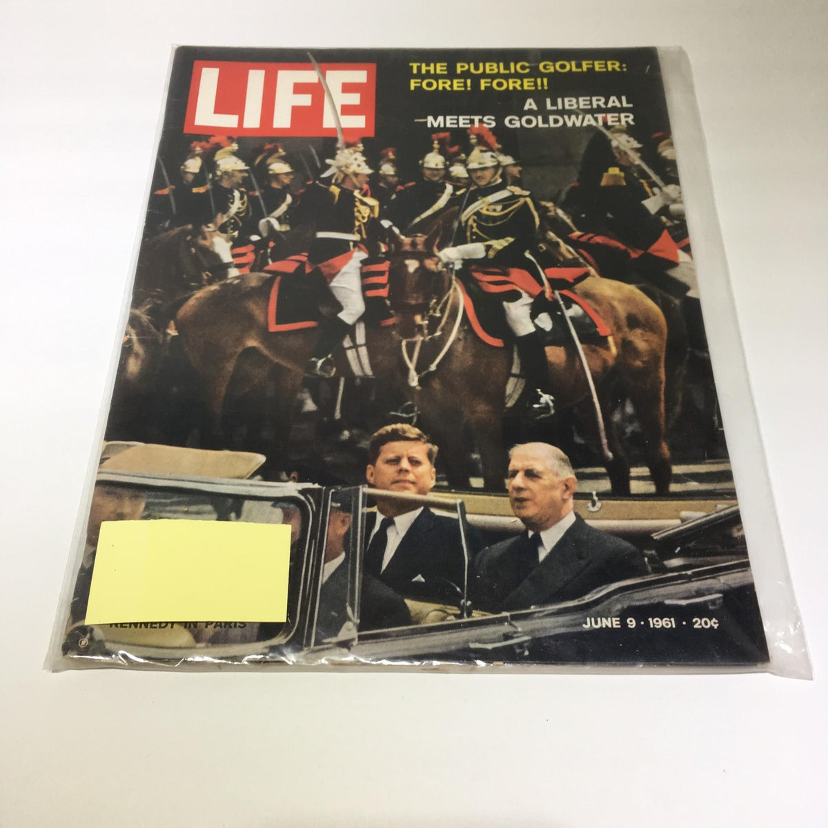 Vintage Life Magazine cover from June 9, 1961 featuring the title 'A Liberal Meets Goldwater' with images of a political event including John F. Kennedy. The magazine is encapsulated in protective plastic wrap, showcasing rich historical significance from the early 1960s.