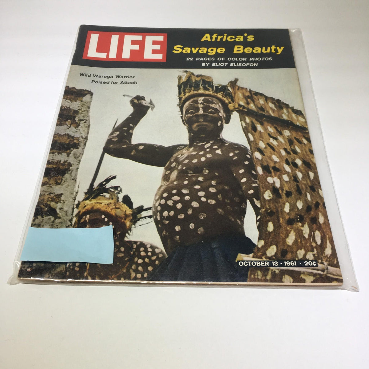 Cover of Life Magazine dated October 13, 1961, featuring the Wild Warega Warrior poised for attack under the title 'Africa's Savage Beauty' with reference to 22 pages of color photos by Eliot Elisofon.