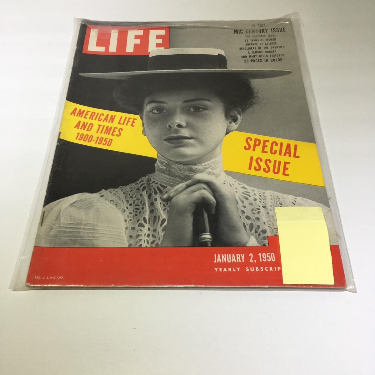 Cover of Life Magazine: Jan 2, 1950 - American Life & Times 1900-1950 Special Issue featuring a woman in a hat, highlighting special issue details.