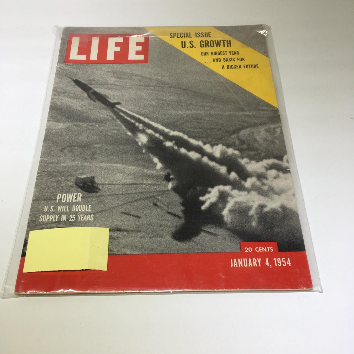 Cover of Life Magazine dated January 4, 1954, featuring the headline "Power U.S Will Double Supply In 25 Yrs" amidst striking imagery related to U.S. growth and advancements. Ideal for collectors and history enthusiasts.