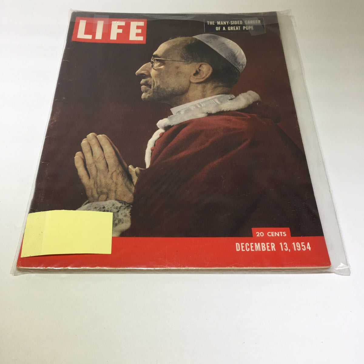 Vintage Life Magazine cover from December 13, 1954, featuring Pope Pius XII in profile, showcasing his iconic figure. This historical magazine is part of a collection that captures significant moments in American history.