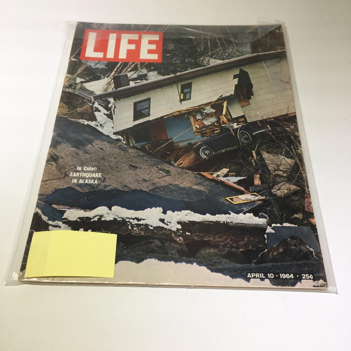 Front cover of VTG Life Magazine April 10 1964, featuring the headline 'In Color: Earthquake in Alaska' with an image showcasing disaster damage, reflective of the historical event.