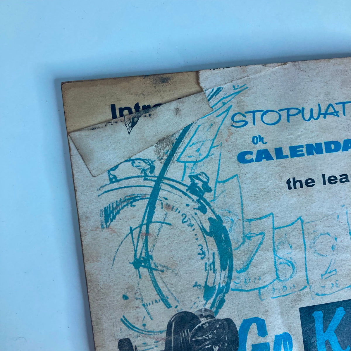 Cover detail of VTG Rod & Custom Magazine December 1959 showing wear and tear, highlighting its vintage status as a collector's item.