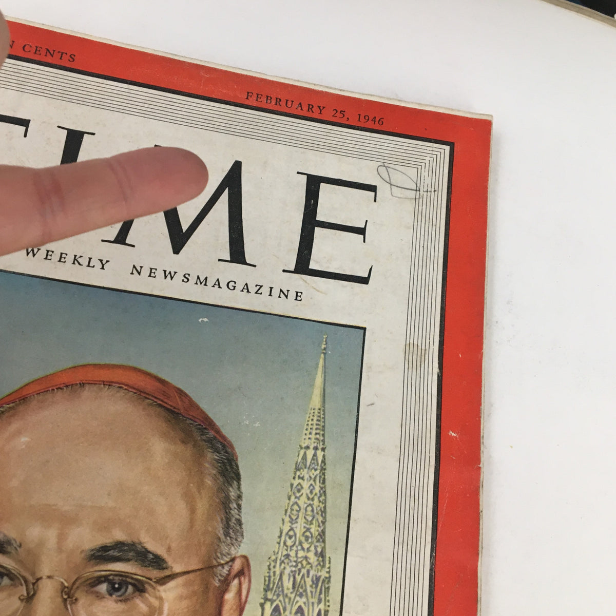 Close-up view of the Time Magazine cover from February 25, 1946, featuring Cardinal Francis Spellman with a visible finger pointing at the title.