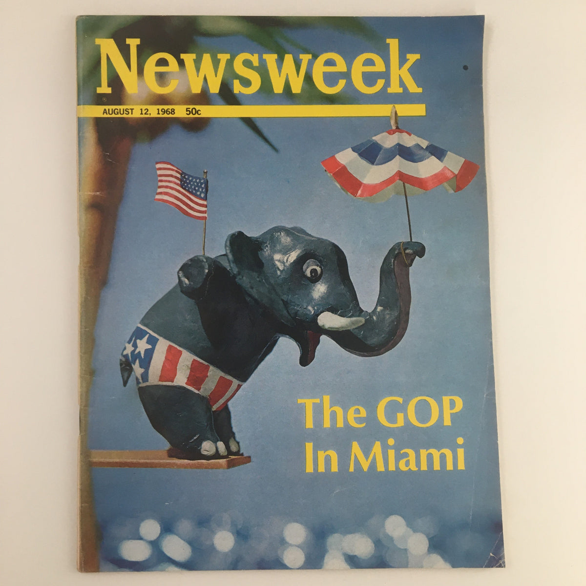Cover of Newsweek Magazine from August 12, 1968, featuring a whimsical elephant mascot for the GOP in Miami, adorned with American flags and a colorful umbrella.