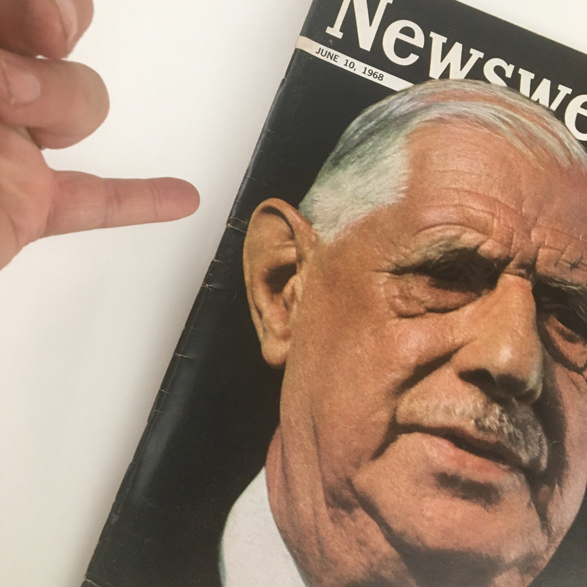 Close-up of Newsweek Magazine June 10, 1968, showcasing President Charles De Gaulle on the cover, with a finger pointing towards the headline.