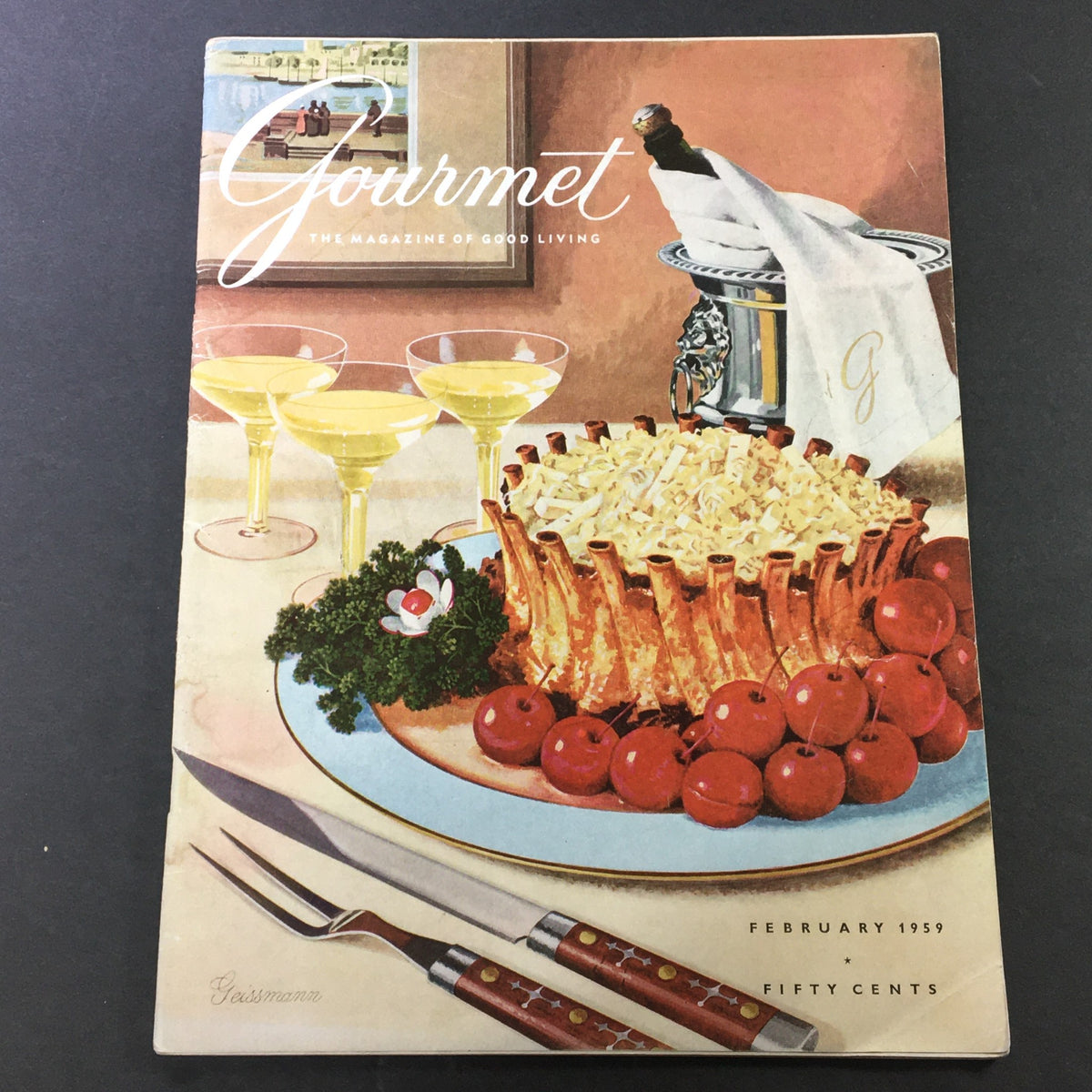Cover of VTG Gourmet Magazine February 1959, featuring a beautifully arranged dining scene with three cocktails, decorated plate with food, and cutlery, showcasing the theme 'Thirteen Rows of Baiken'.