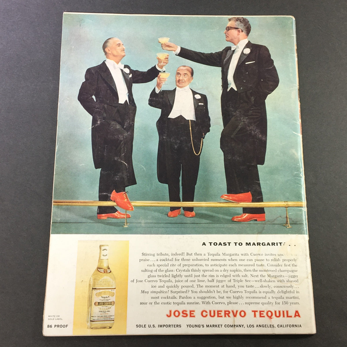 Back cover of VTG Gourmet Magazine February 1959, featuring three elegantly dressed men toasting with cocktails, promoting Jose Cuervo Tequila with a colorful illustration.