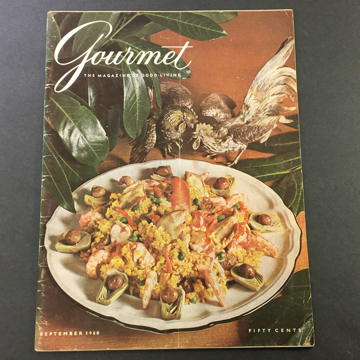 Cover of VTG Gourmet: The Magazine of Good Living - September 1960 showcasing a colorful seafood dish with shrimp and rice, surrounded by leaves.