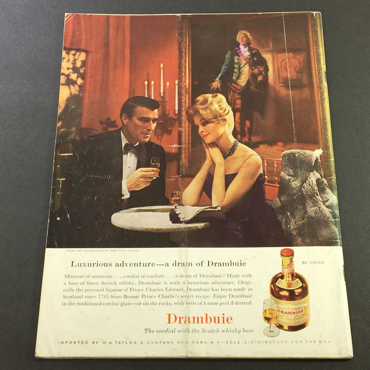 Back cover of VTG Gourmet: The Magazine of Good Living - September 1960 featuring an advertisement for Drambuie, depicting a couple in a luxurious dining setting.