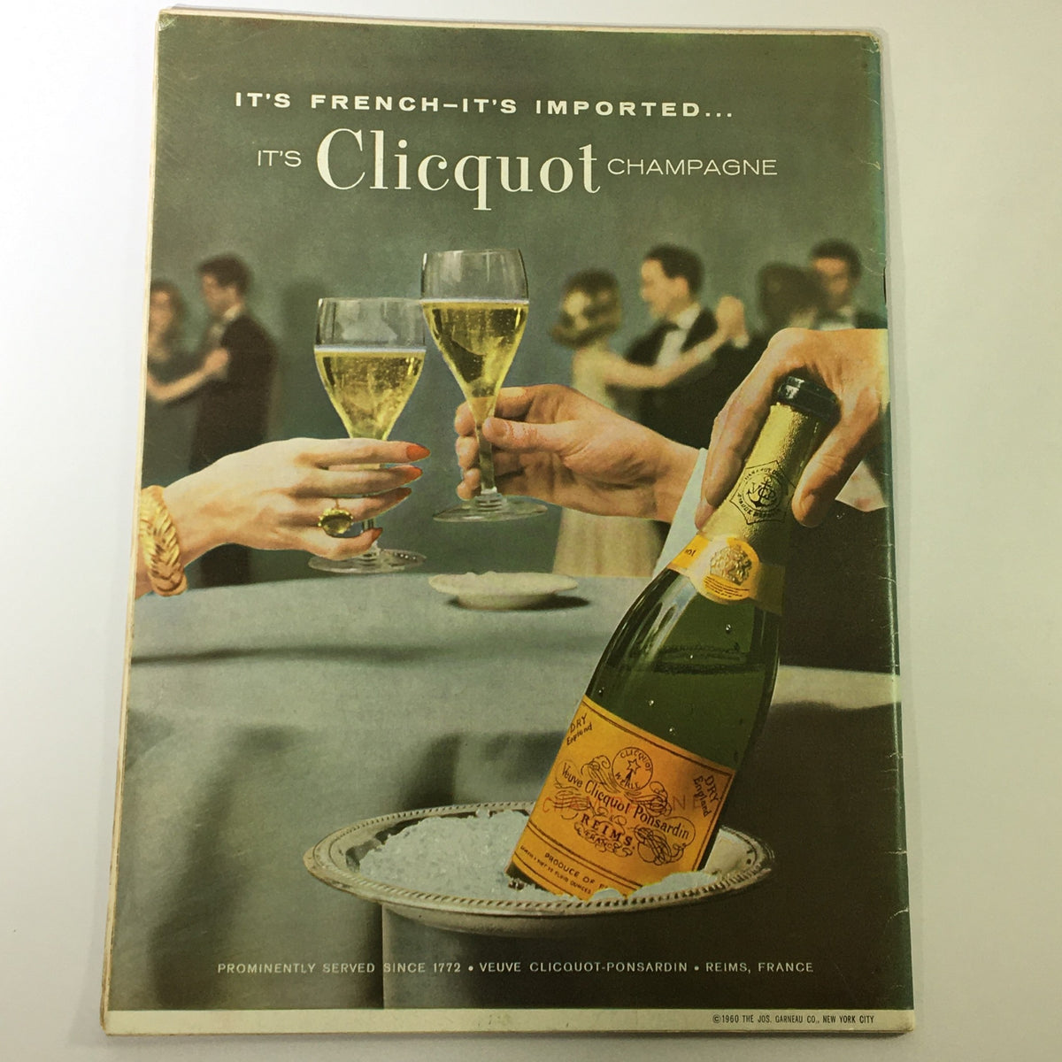 VTG Gourmet The Magazine of Good Living April 1961 featuring a Clicquot Champagne advertisement with elegantly dressed individuals enjoying champagne in a vintage celebration setting.