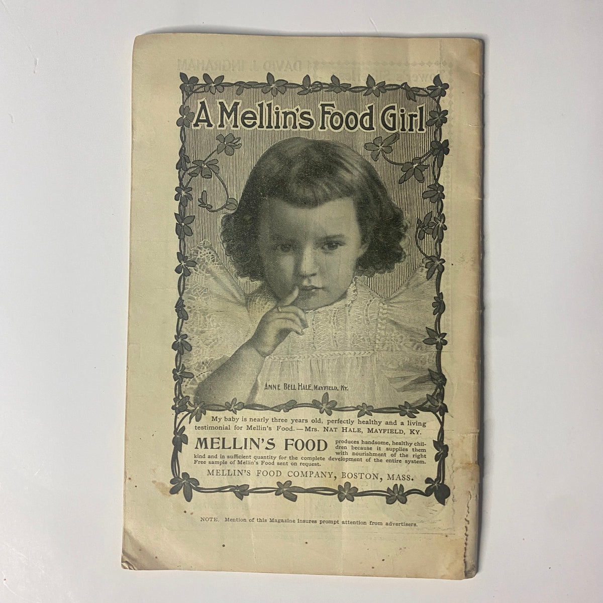 Cover of 'A Mellin's Food Girl' advertisement featuring a young girl, used in the New England Home Magazine dated August 6, 1899, highlighting the nutritional benefits of Mellin's Food.