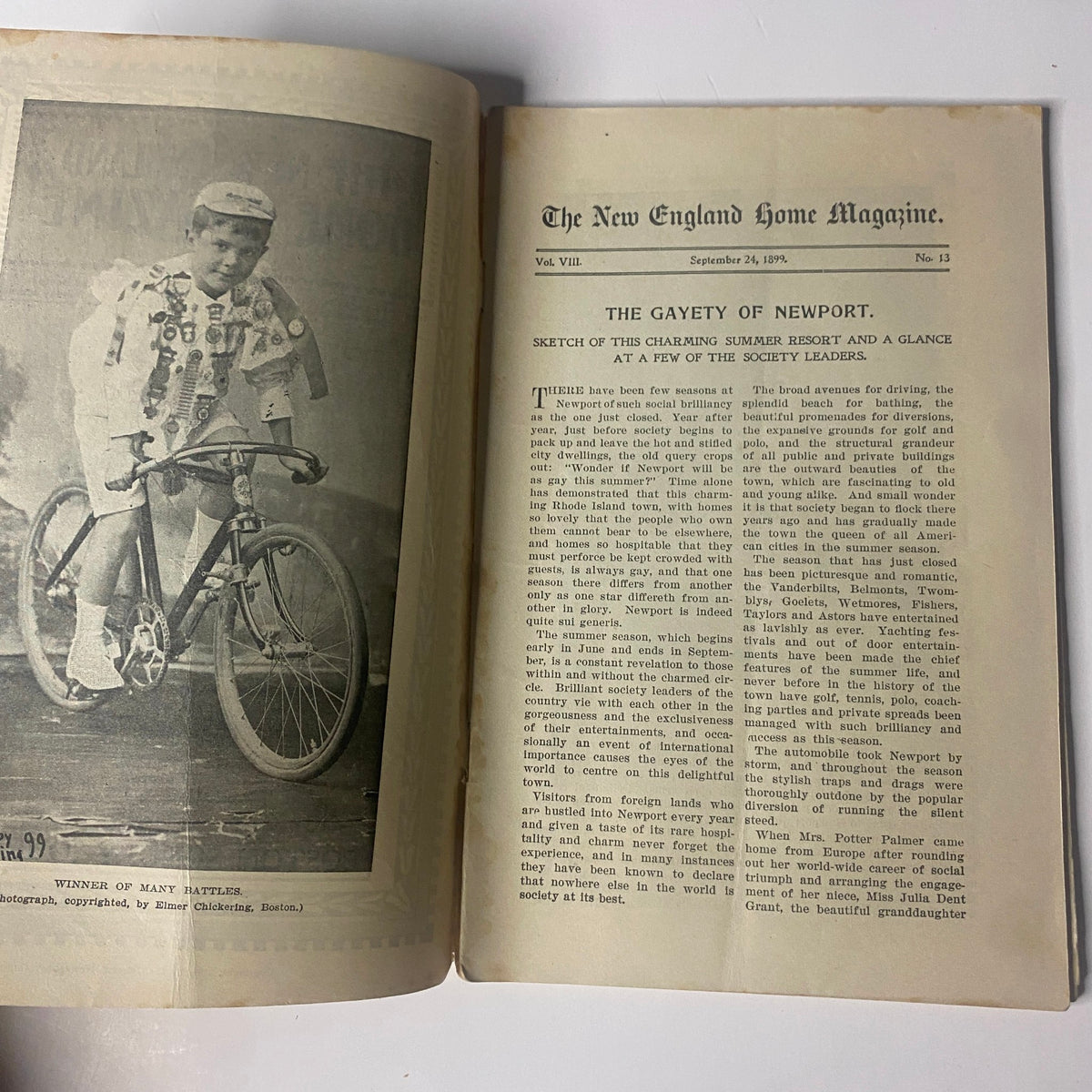 Interior page of The New England Home Magazine from September 24, 1899, showcasing an article titled 'The Gayety of Newport' with a photograph of a young cyclist.