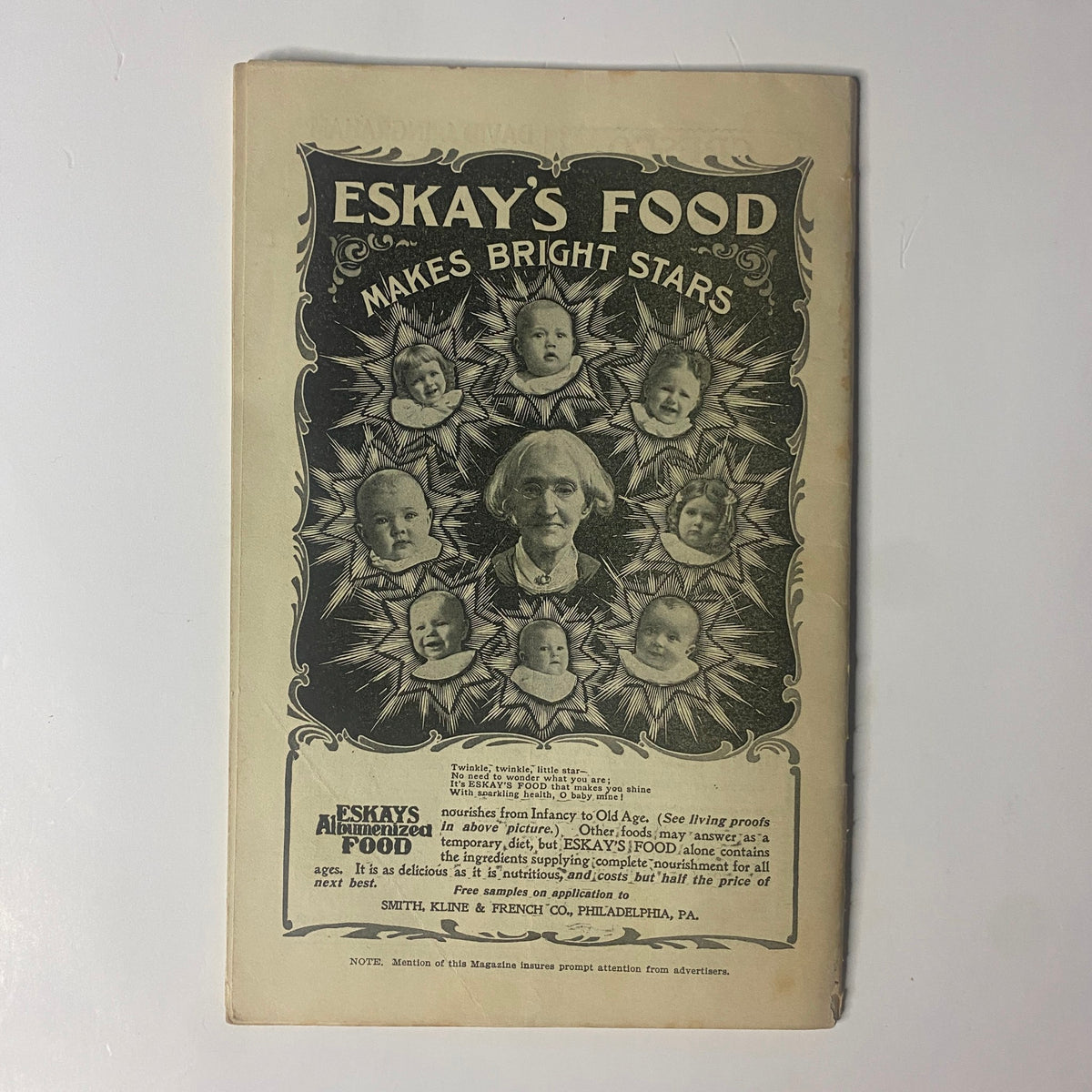 Back cover of The New England Home Magazine from June 18, 1899, advertising Eskay's Food with a creative design featuring multiple infant portraits.