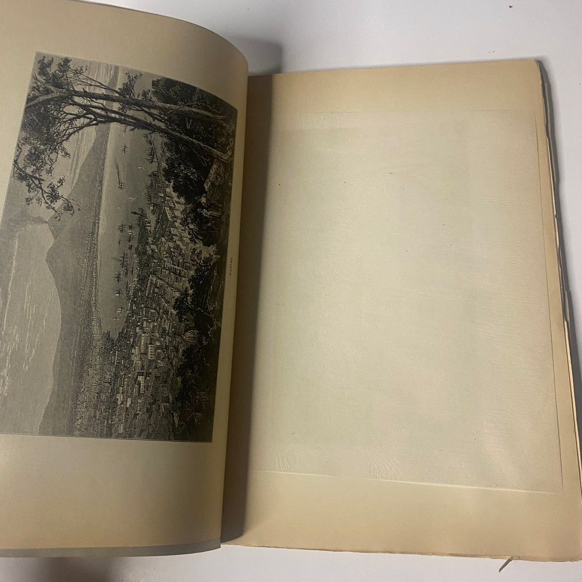 Interior page of 'Around the World with General Grant, Part Seven' showing an unillustrated section with a blank layout, showcasing the book's vintage design and print quality.
