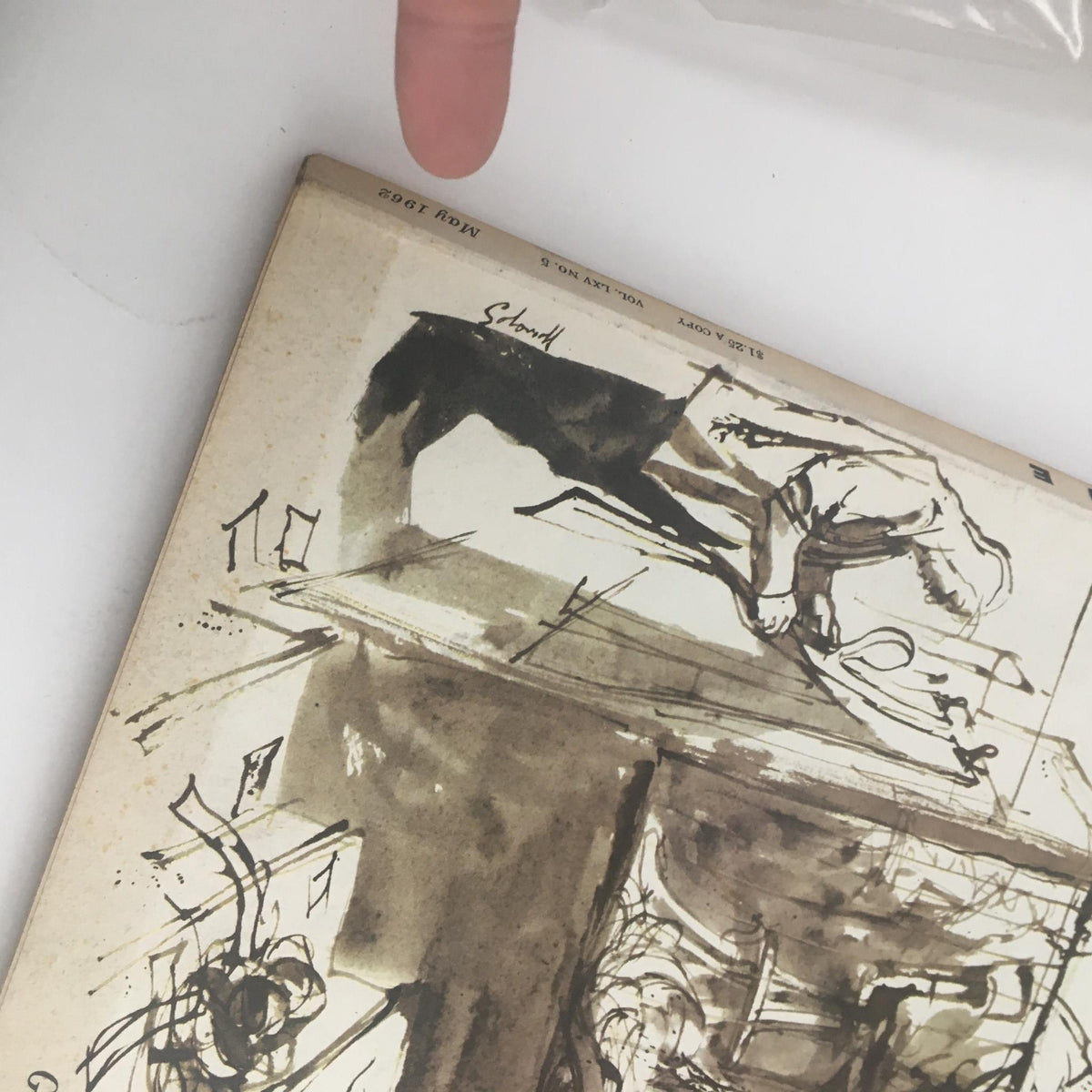 Close-up of the top edge of Fortune Magazine May 1962 depicting the month and year along with an illustration on the cover.