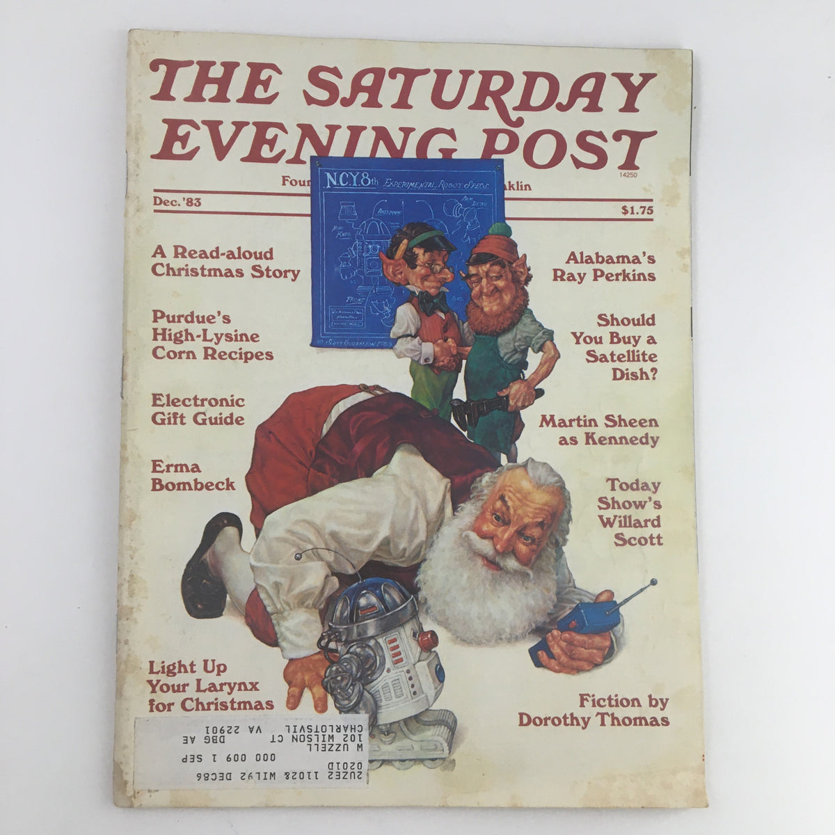 Cover of The Saturday Evening Post December 1983 featuring Alabama's Ray Perkins and Martin Sheen, showcasing festive illustrations and articles, including holiday stories and recipes.