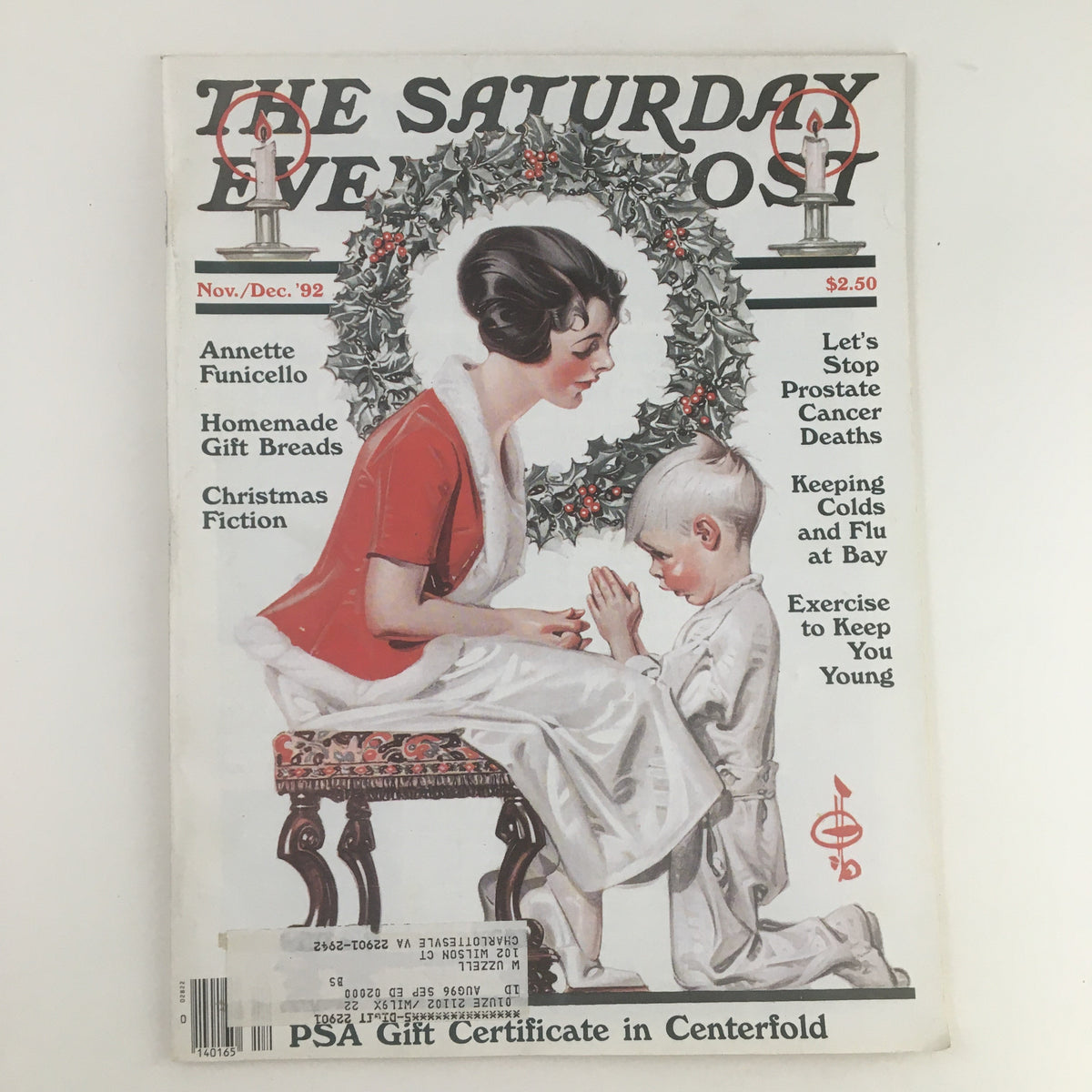Cover of The Saturday Evening Post, November 1992 issue featuring Annette Funicello, homemade gift breads, and Christmas fiction. The cover illustrates a woman in red with a child, surrounded by a festive wreath and candle.