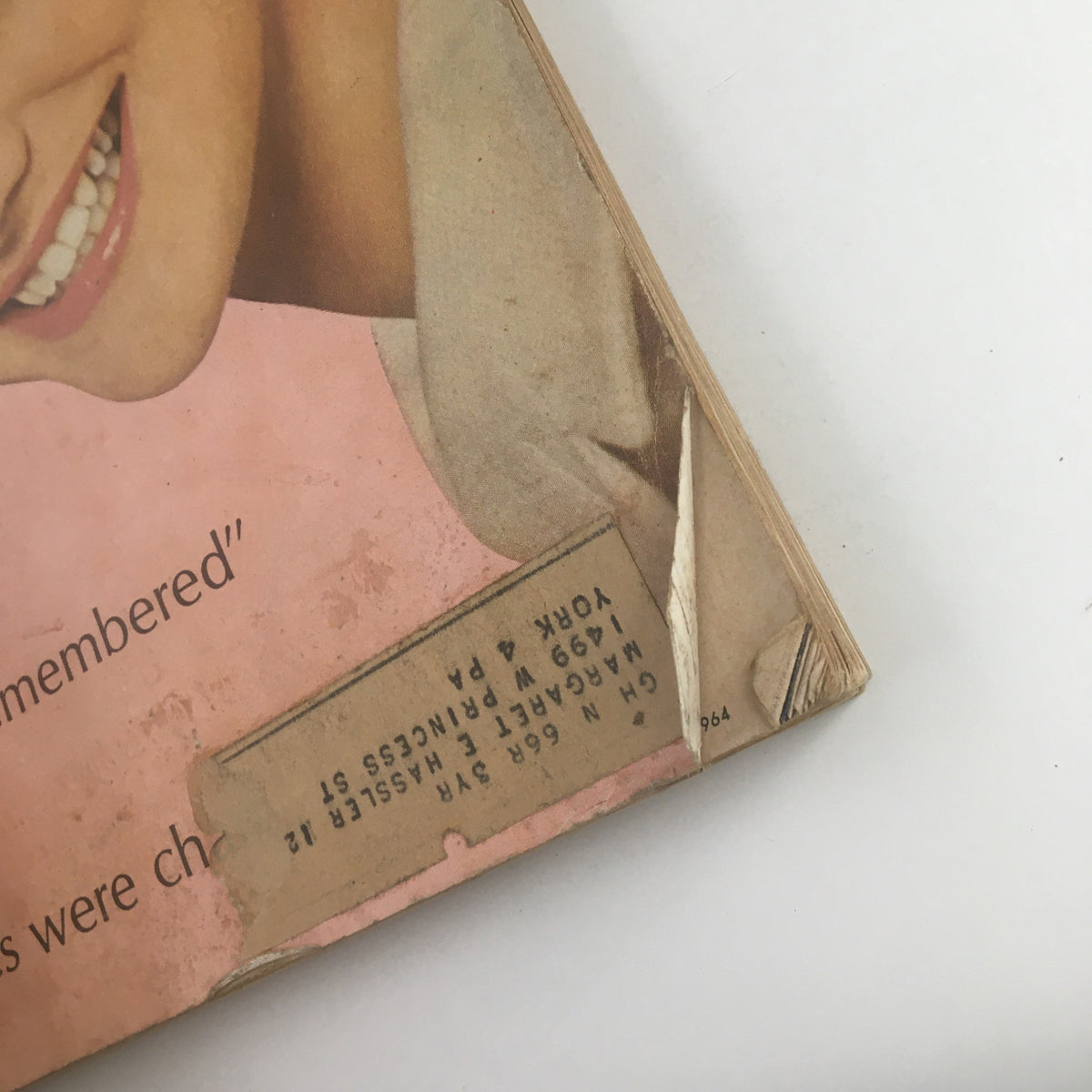 Close-up of the cover of Good Housekeeping Magazine November 1964 showing the bottom portion with Jackie Kennedy's quote and an address label.