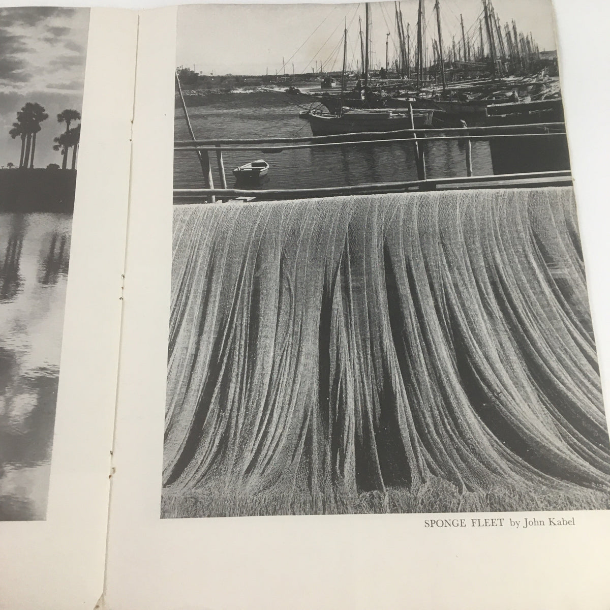Page from Scribner's Magazine June 1938 Vol. 103 No. 6 showcasing a black and white photograph titled 'Sponge Fleet' by John Kabel, depicting a serene harbor scene with sailing boats and a unique fabric texture.