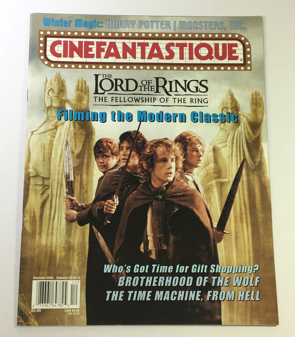 Cinefantastique December January 2002 Vol 33 #6 magazine cover featuring a scene from The Lord of the Rings, showcasing characters with swords in a dramatic pose.
