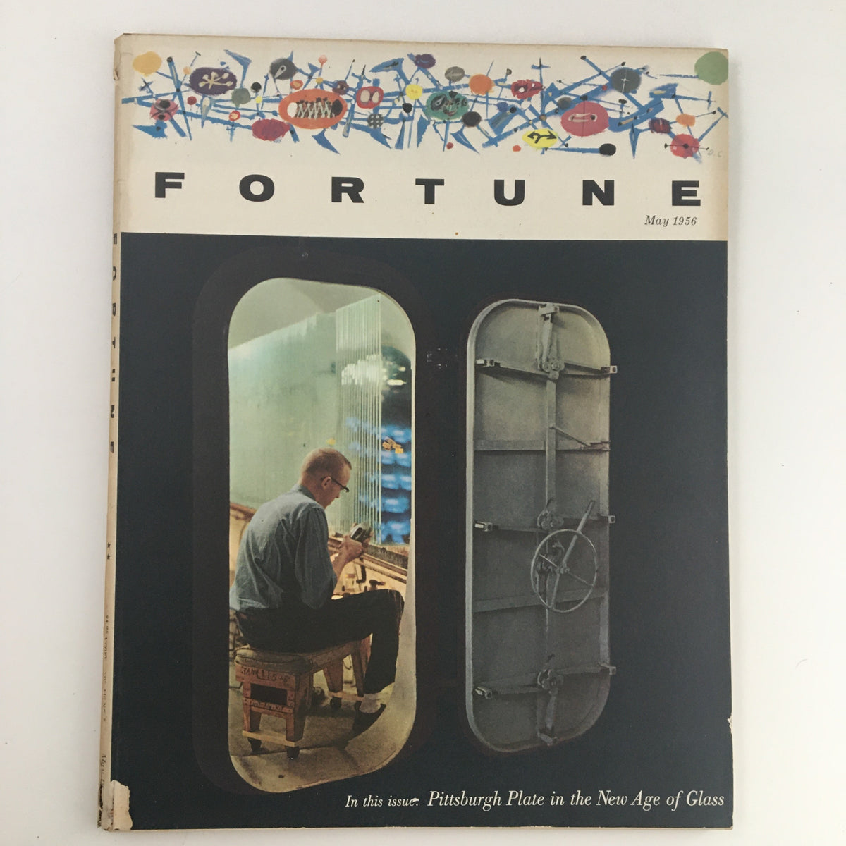 Cover of Fortune Magazine from May 1956 featuring the theme 'Pittsburgh Plate in the New Age of Glass'. The image depicts a man working on glass art, symbolizing innovation in the glass industry.