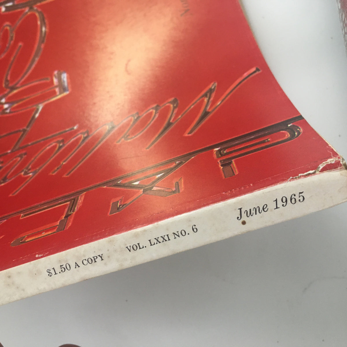 Close-up view of Fortune Magazine June 1965 showcasing the magazine price of $1.50 and publication details, emphasizing its collectible vintage appeal.