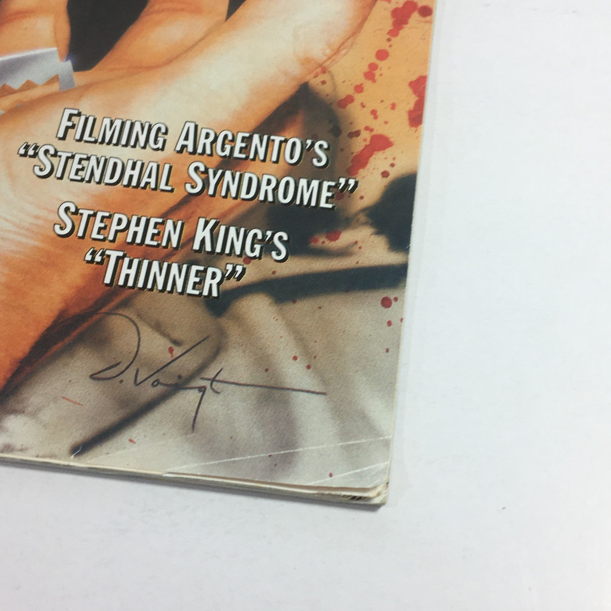 Close-up of the cover of Cinefantastique April 1996 Vol 27 #8 highlighting the titles 'Filming Argento's Stendhal Syndrome' and Stephen King's 'Thinner,' with a stylized graphic and signature.