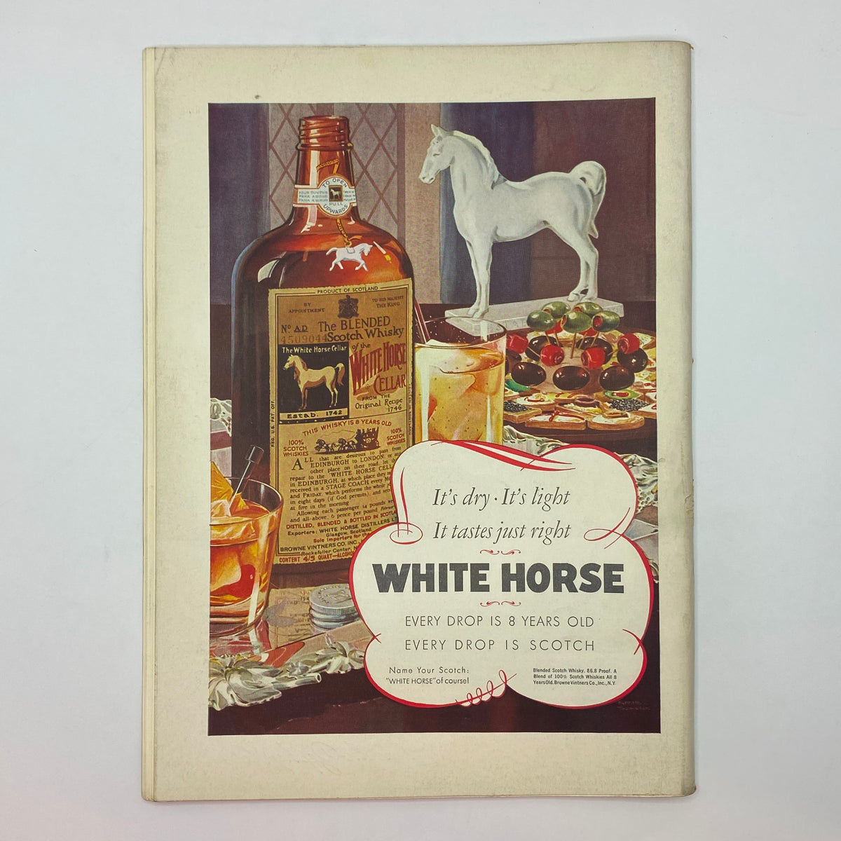 Vintage advertisement for White Horse Scotch from The New Yorker magazine, September 10, 1938, featuring a bottle and glass of whisky, highlighting classic mid-century branding.