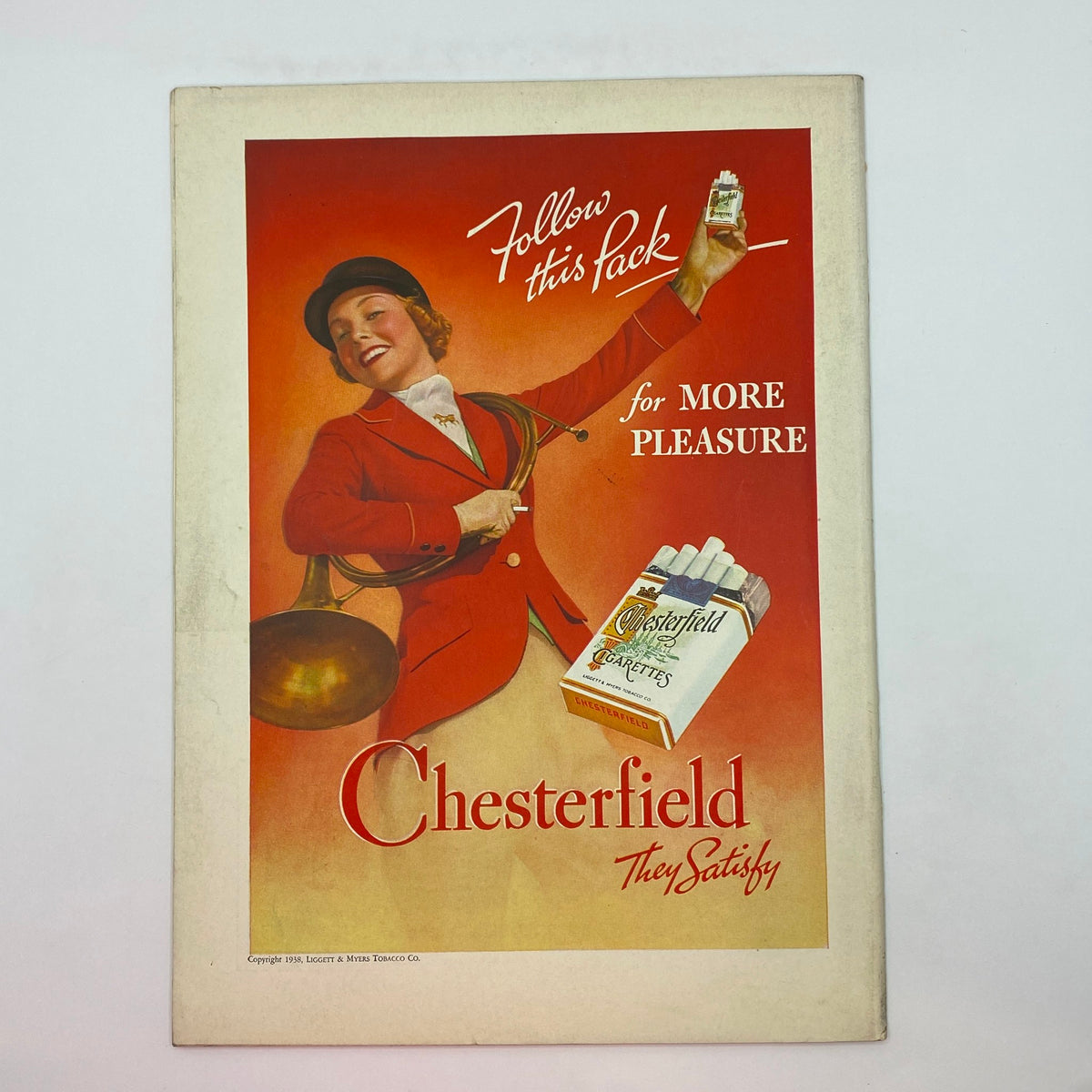 Vintage advertisement from The New Yorker March 5, 1938, promoting Chesterfield cigarettes with the tagline 'Follow this Pack for More Pleasure'.