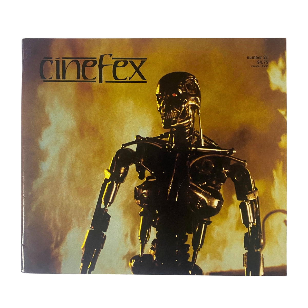 Cinefex Magazine April 1985 No. 21 featuring The Terminator on the cover, showcasing an iconic cyborg endoskeleton emerging from flames.