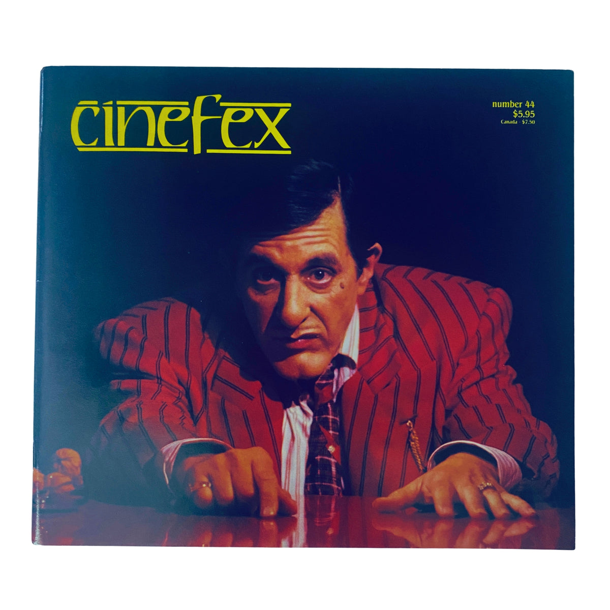 Cover of Cinefex Magazine November 1990 No. 44 featuring a character in a striped suit, likely related to the article on Dick Tracy, labeled as Near Mint (NM) condition.