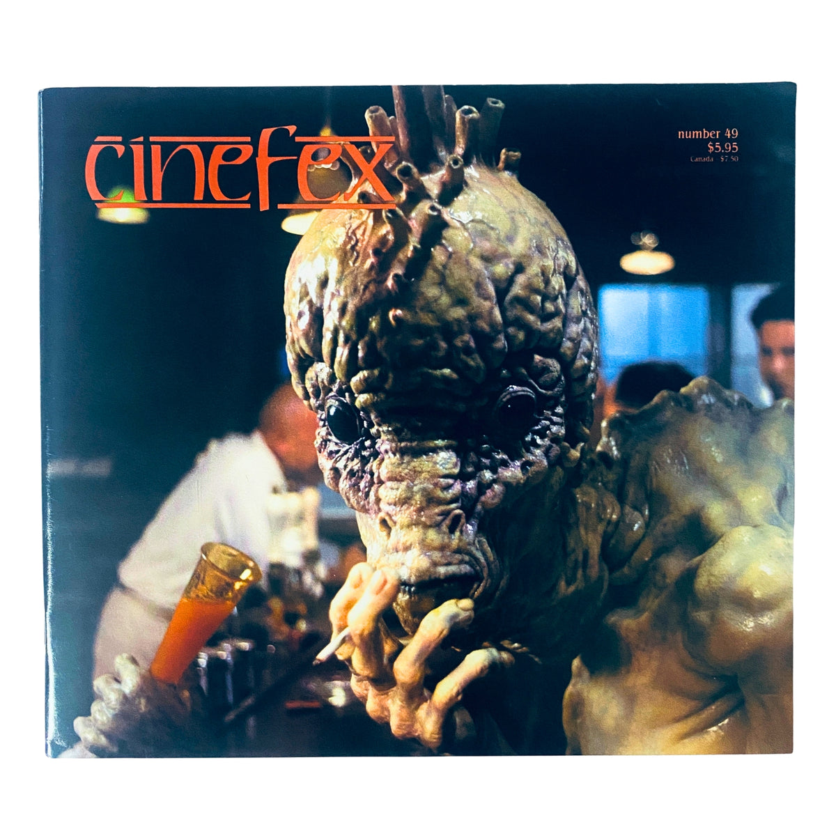 Cinefex Magazine February 1992 No. 49 featuring a grotesque creature from Naked Lunch on the front cover, showcasing the magazine's focus on visual effects and makeup artistry.