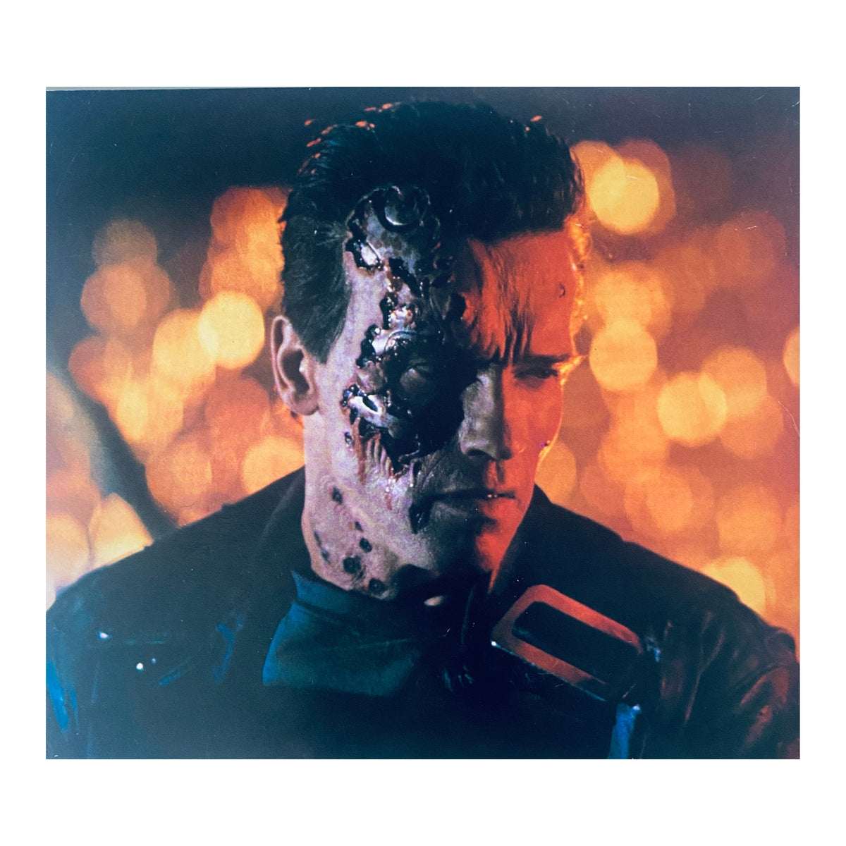Close-up image of the Terminator character from Cinefex Magazine No. 47 (1991), showcasing detailed visual effects work, including the battle-damaged face, representing the film Terminator 2: Judgment Day.