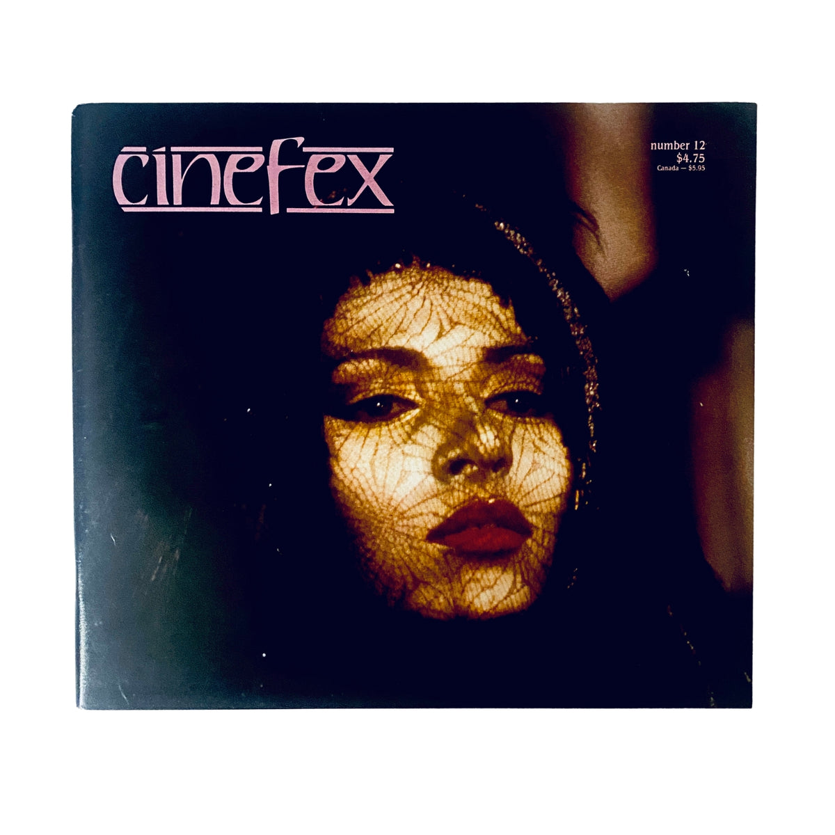Cinefex Magazine April 1983 No. 12 featuring a cover image of a woman with intricate lace shadows, highlighting the theme of 'Something Wicked This Way Comes'.