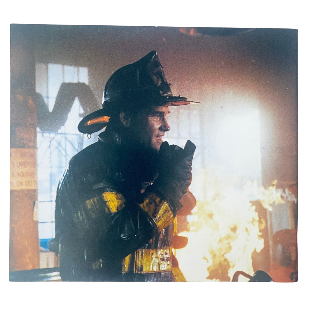 Image from Cinefex Magazine November 1991 No. 48 featuring a firefighter in full gear, capturing a dramatic moment within a fire scene related to the film Backdraft.