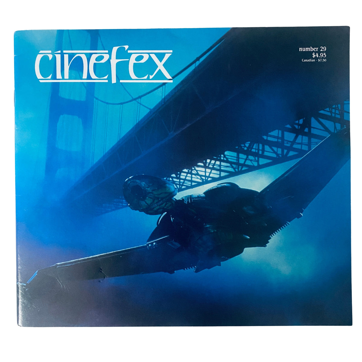 Cinefex Magazine February 1987 No. 29 showcasing a dramatic cover image with a fighter jet flying under a bridge, representing special effects and visual storytelling in cinema.