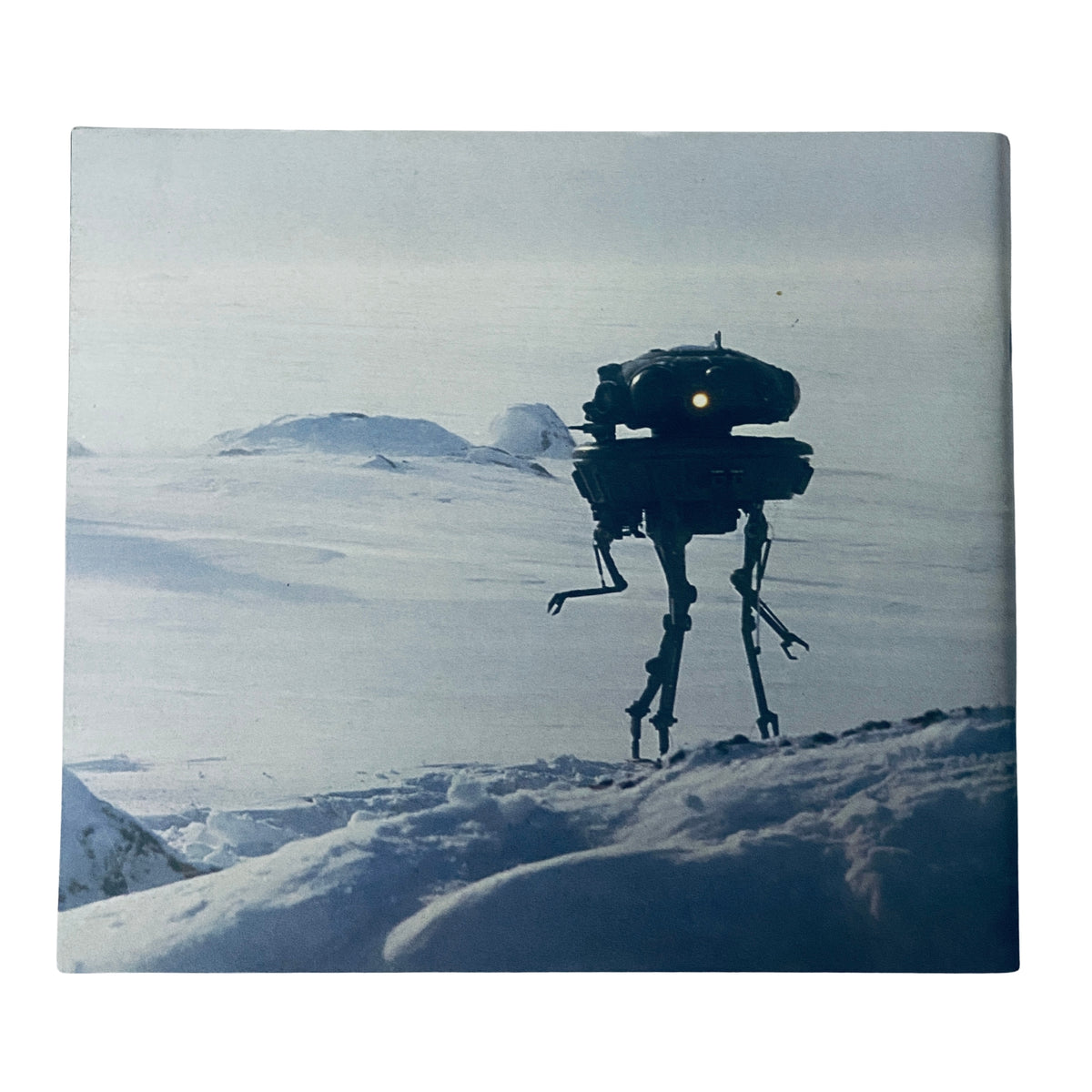 Cover image of Cinefex Magazine December 1980 No. 3 featuring an Imperial probe droid from The Empire Strikes Back standing in a snowy landscape, showcasing the artistry behind special effects in cinema.