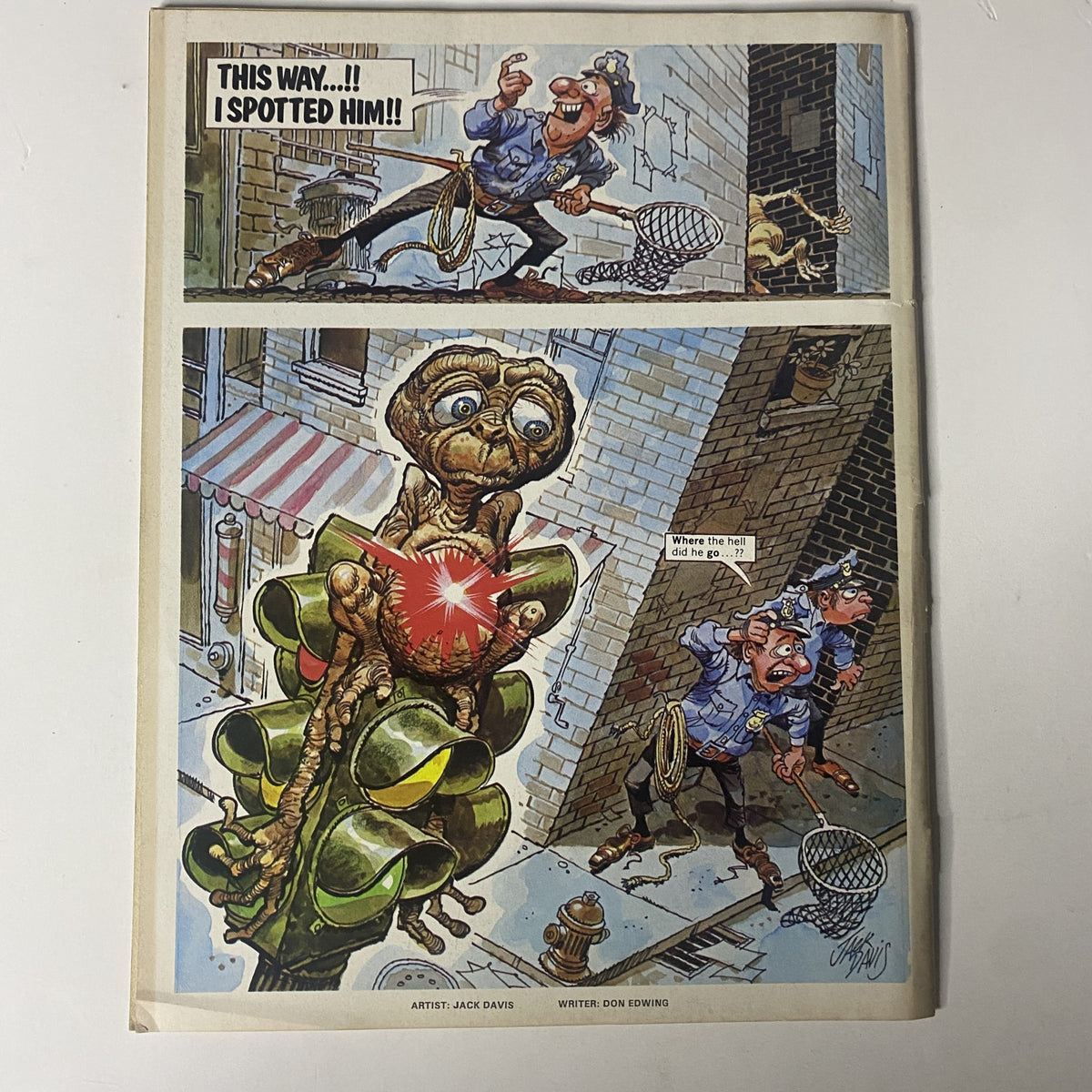 Cartoon illustration from Mad Magazine January 1983 No. 236 depicting E.T. being pursued by police, with humorous dialogue and vibrant artwork.