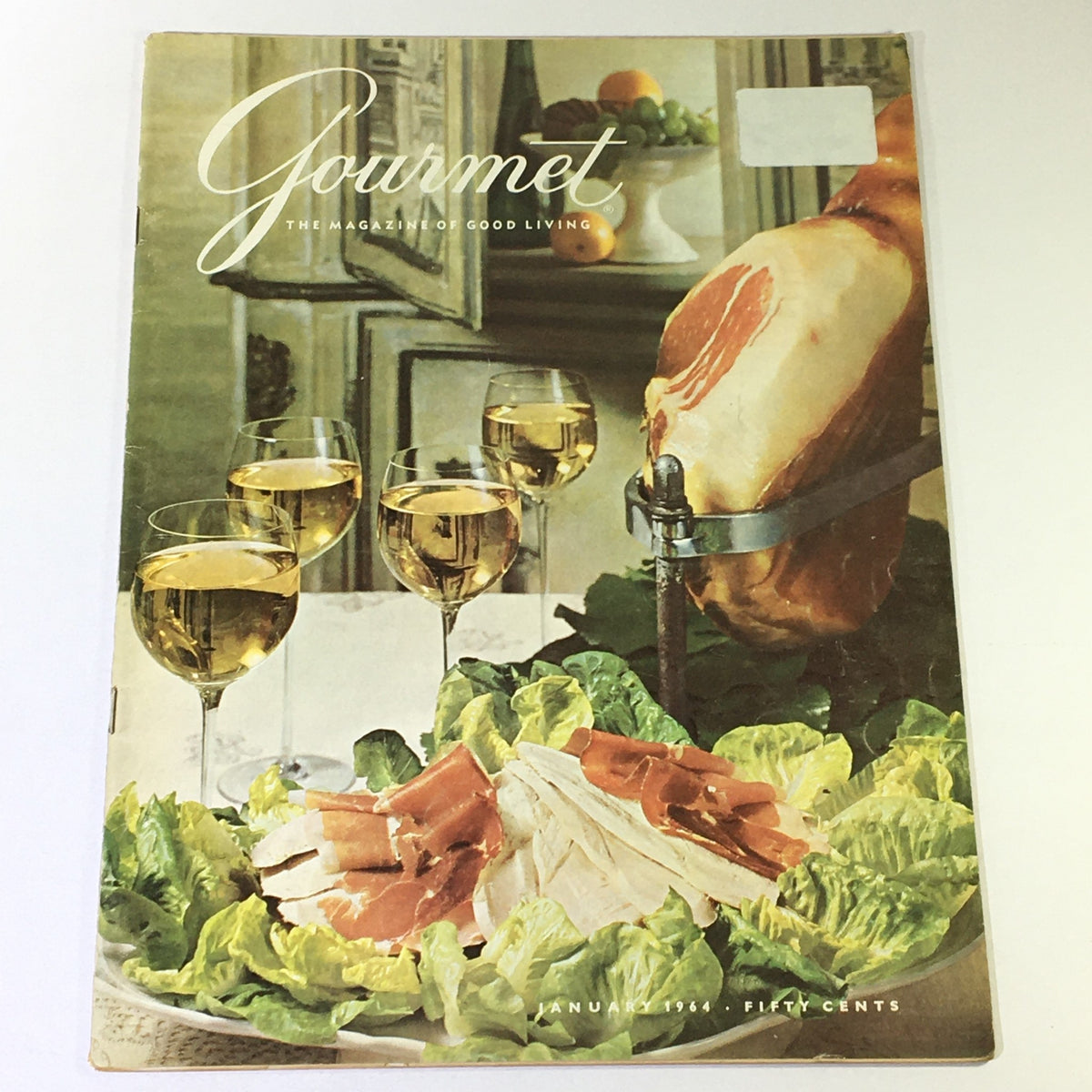 Cover of VTG Gourmet The Magazine of Good Living January 1964 featuring a beautifully arranged table with gourmet food and drinks, themed 'For the Love of Oranges'.