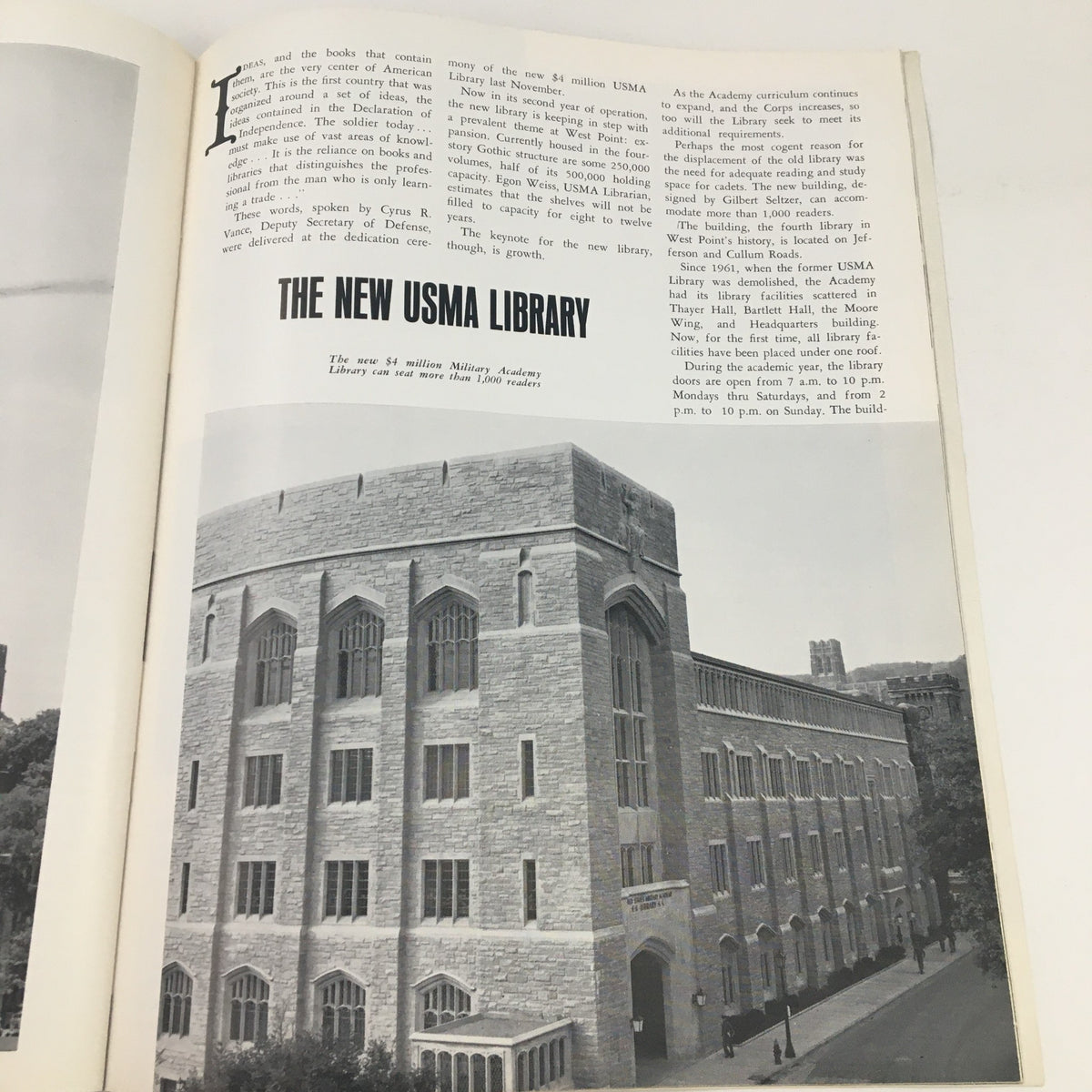 Interior page of Gridiron Magazine November 13, 1965 showcasing 'The New USMA Library' with an image of the architectural structure and details about its features. Collectible sports memorabilia highlighting Wyoming's football legacy.
