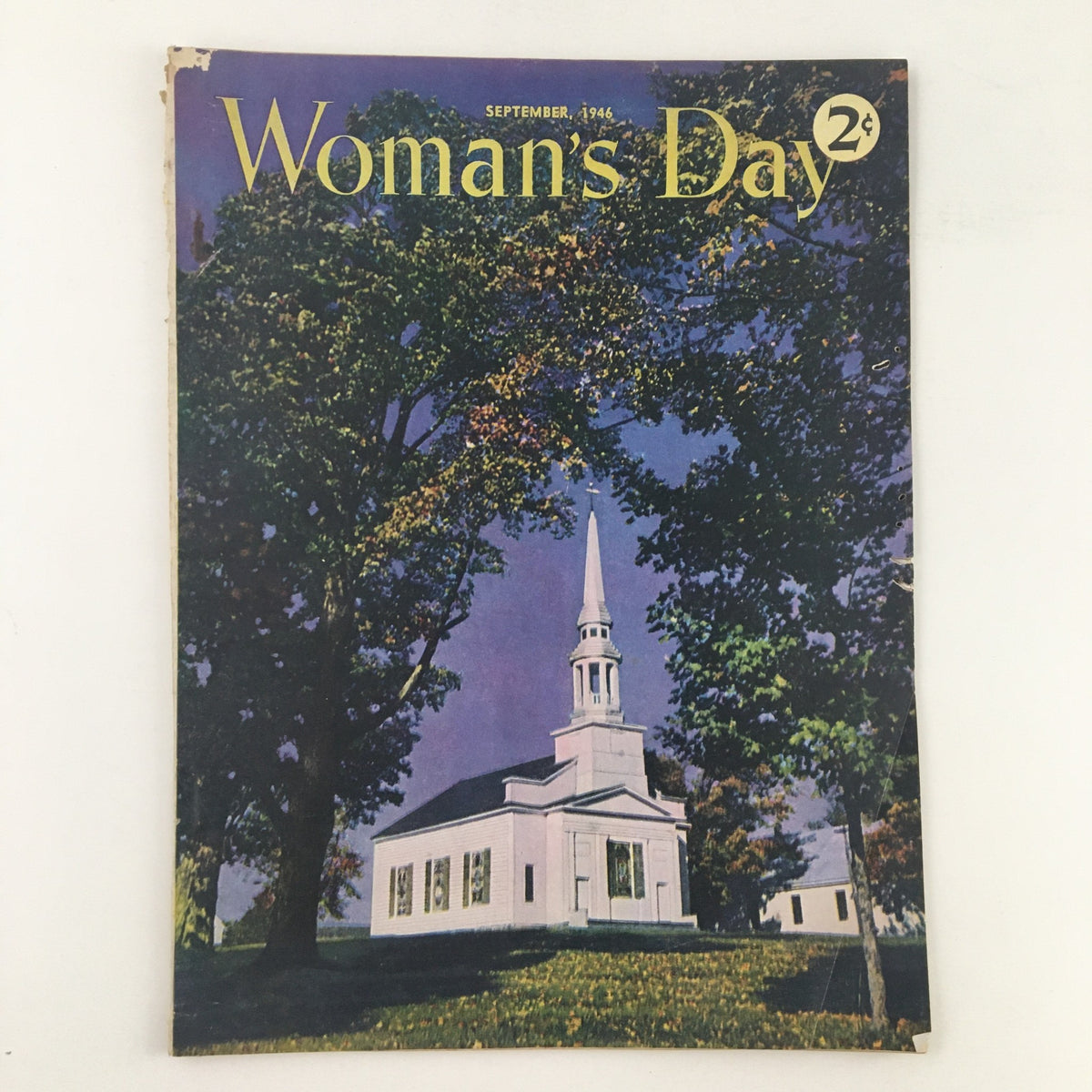 Cover of Woman's Day Magazine September 1946 featuring a Mid Century Victorian house, showcasing vintage architecture and vibrant colors.