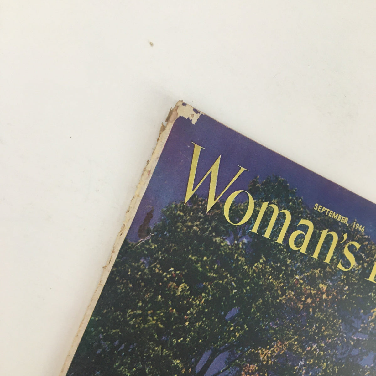 Close-up of the top corner of Woman's Day Magazine September 1946, highlighting the magazine title and publishing date.
