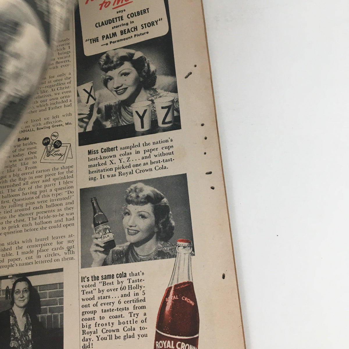 Interior page from Woman's Day Magazine November 1942 featuring an advertisement for Royal Crown Cola with an illustration of Claudette Colbert.