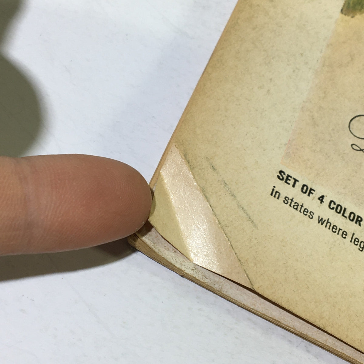 Detail image showing minor wear on the corner of the VTG Gourmet The Magazine of Good Living January 1966, highlighting its collectible charm.