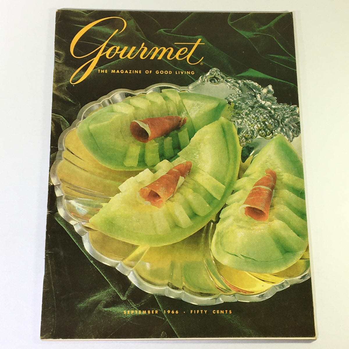 Cover of VTG Gourmet The Magazine of Good Living September 1966, featuring a vibrant dish of green melons garnished with rolled prosciutto, capturing the essence of gourmet living.