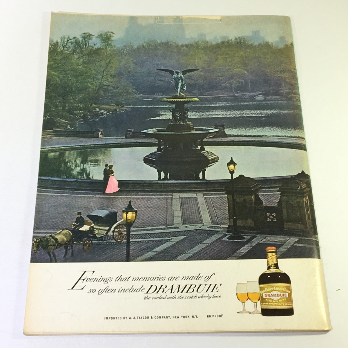 Cover of VTG Gourmet The Magazine of Good Living September 1966 featuring a serene park scene with a fountain and people enjoying an evening, highlighting the theme 'The Time of Couscous'.