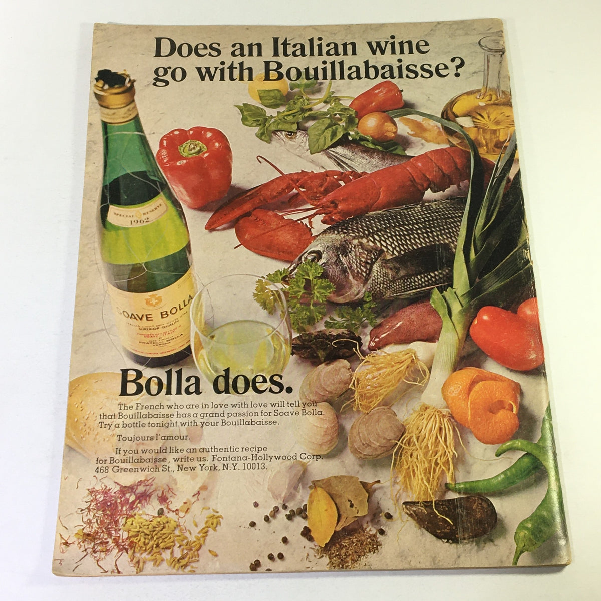 Cover of VTG Gourmet Magazine from February 1969 featuring vibrant food imagery, showcasing Italian wine paired with Bouillabaisse ingredients including seafood, vegetables, and herbs. This issue is themed 'The Compleat Housekeeper', reflecting the culinary culture of the 1960s.